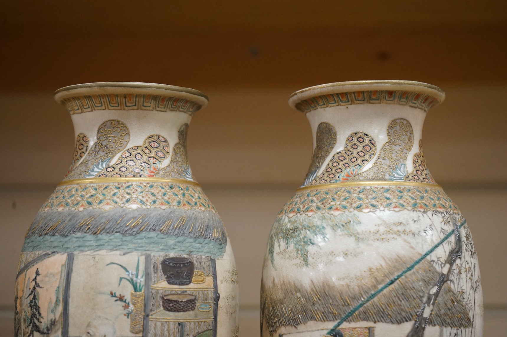 A pair of Japanese Satsuma vases,Meiji period, signed, 23cm